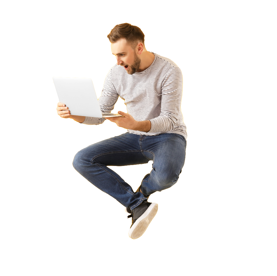 Man working on a laptop sitting on a chair